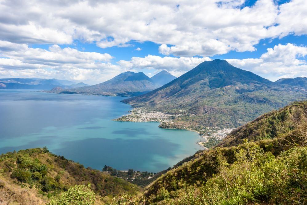 Lake Atitlán and its volcanoes seen from the hillside