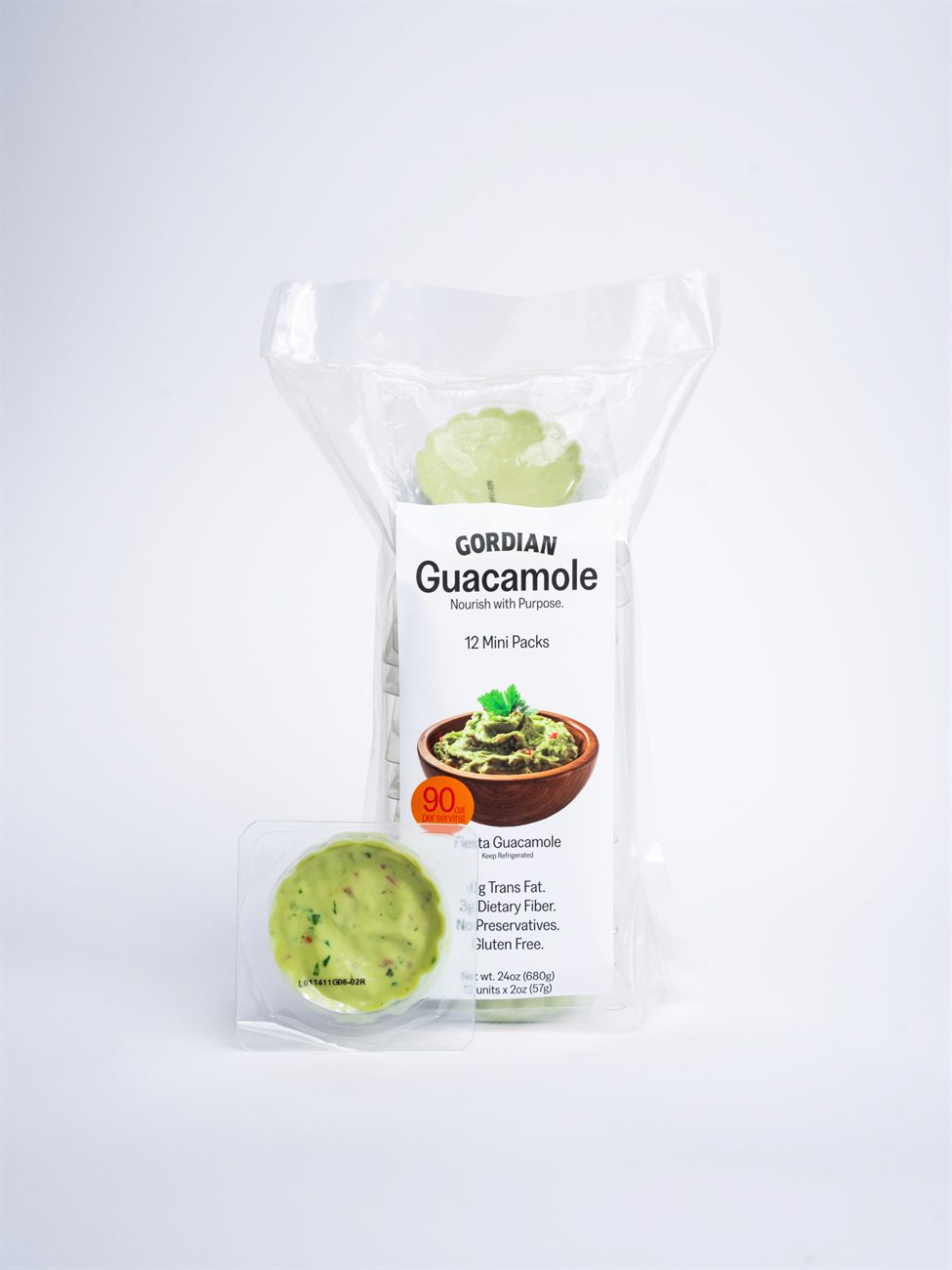 A bag of Gordian Fiesta Guacamole 12 Mini Packs with one mini cup in front